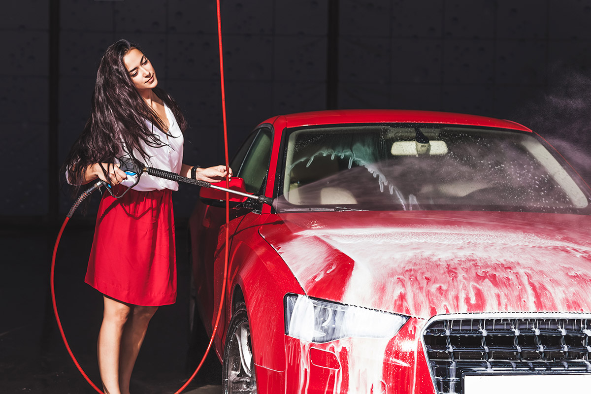 Woman uses self serve car wash